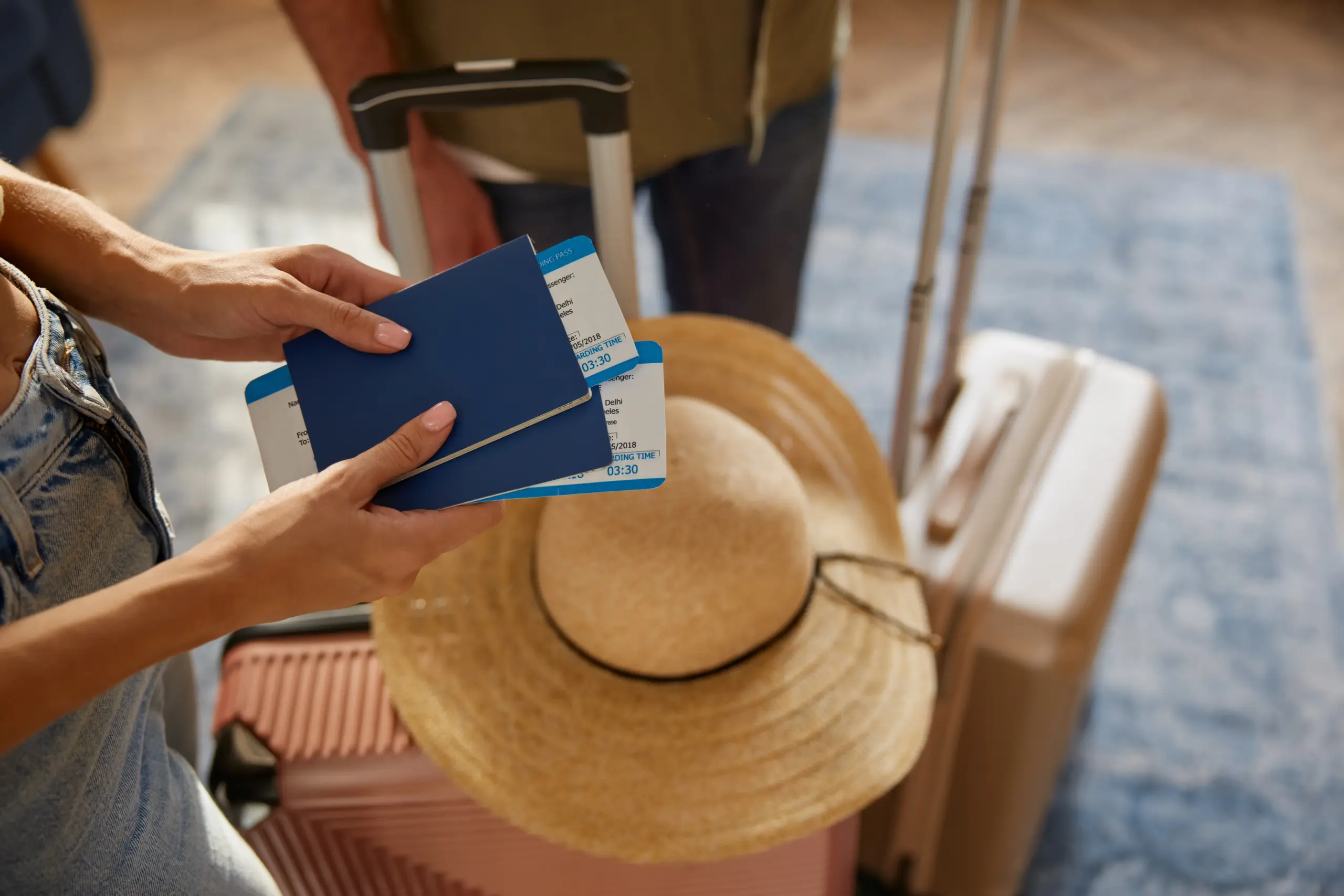Famale holding passport and ticket with boarding - Galapagos Entry Requirements 2026: The New $200 Fee and Mandatory Forms - Galapagos Island