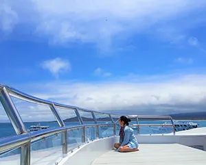 girl watching the ocean in galapagos